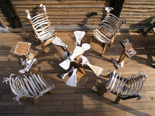outdoor tables and chairs made from bones and wood