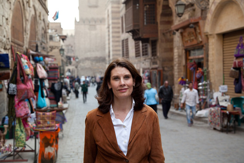 Pilgrim walking down the street in a foreign country