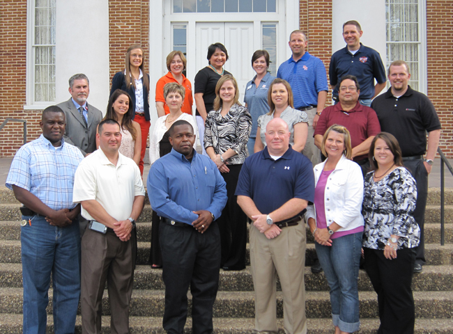 members of SHSU High Potential Leadership Academy standing on the steps in front of Austin Hall