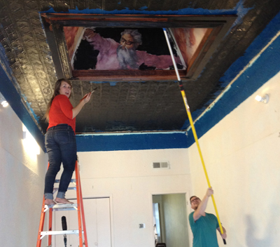 students painting the ceiling