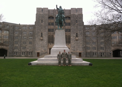 ROTC cadets in front of statue at West Point
