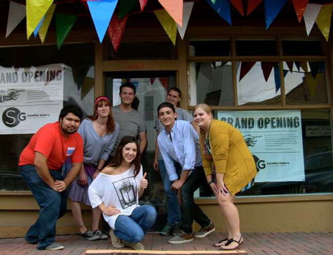 students in front of new gallery