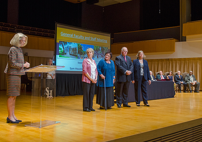 Dana Gibson presenting Faculty Excellence Awards