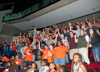 a crowd of students showing school support