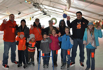 junior bearkats and staff posing for a picture on the ice