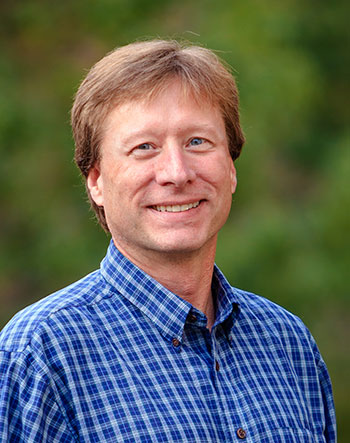 headshot of Michael Strauss