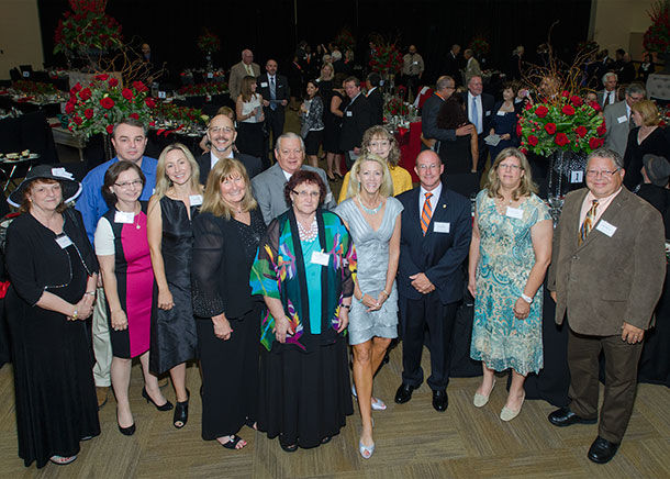 University President Hoyt and Provost Hebert with Full Professors at awards dinner