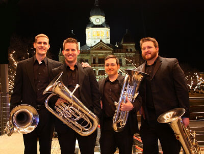 The UNT Euphonium Choir posing with their instruments