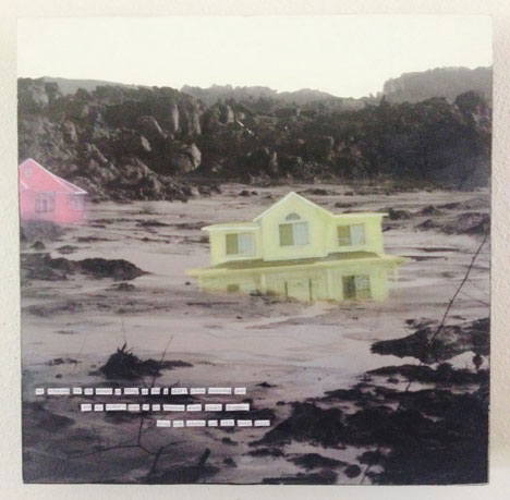 barren landscape with a yellow house sinking into sand and a pink house in the background