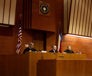 close up of judges sitting on the bench