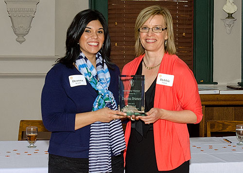 Deanna Briones and Debbie Nichols pose with Deanna's award