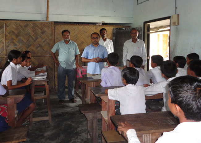 Nath in front of sutdents in India