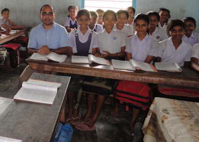 Nath sitting with Indian students