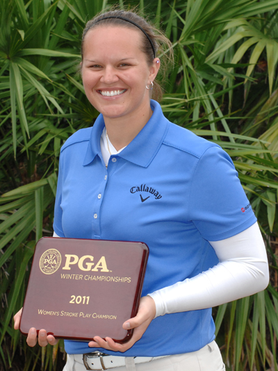 Borocz poses with plaque