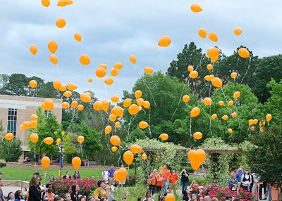 Dozens of baloons released