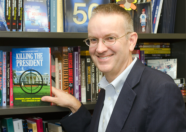 Oliver presenting his book