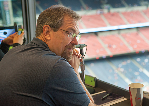 Brady in his announcer booth