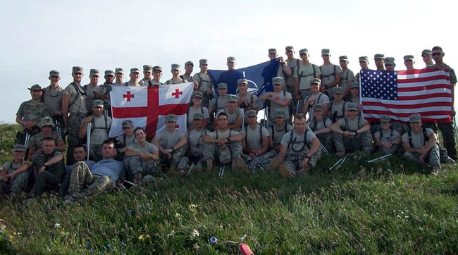 cadets holding American flag