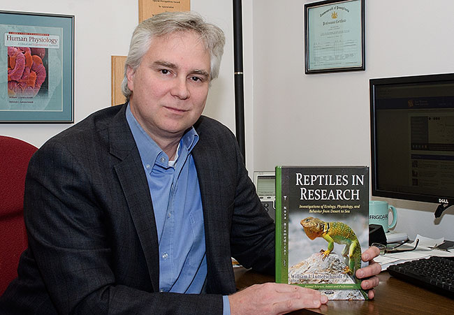 Lutterschmdit posing with book