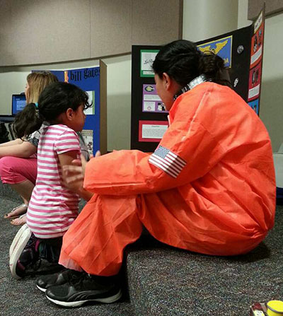 Garcia showing a student her presentation