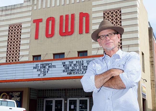 McCarley in front of old town theater