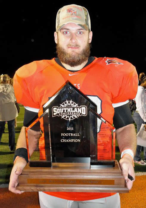 Travis Watson with the trophy
