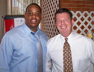 Henderson and Wilson posing for a picture