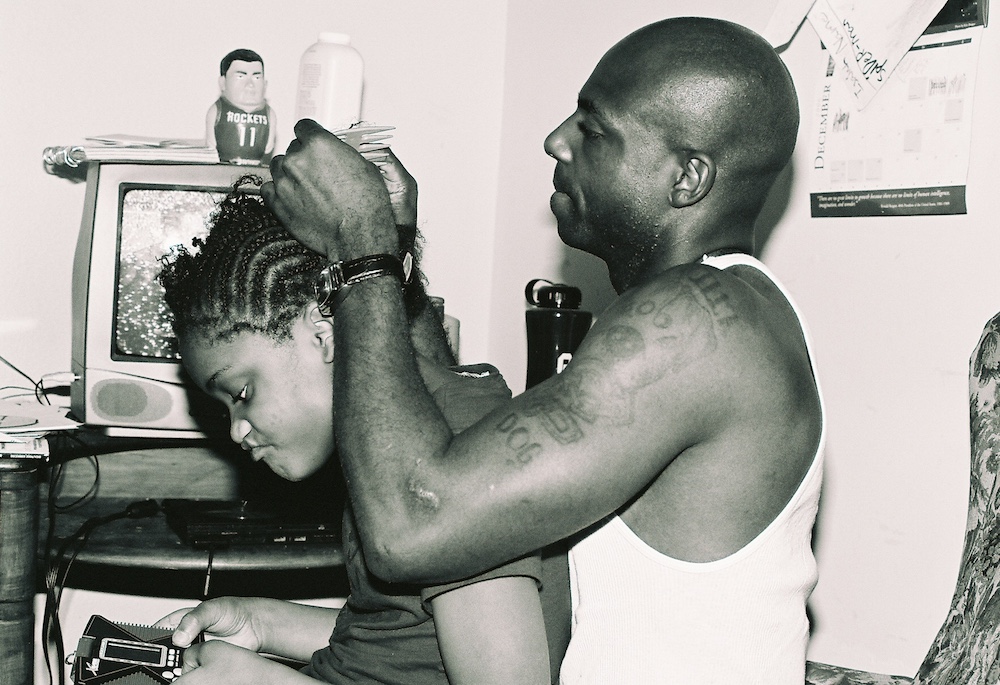 "Man Braiding Hair" by Nancy Keeling - Best In Show 2011