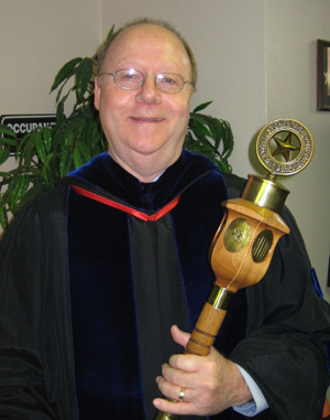 Jim Tiller with ceremonial mace.