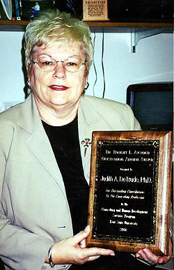 DeTrude with award