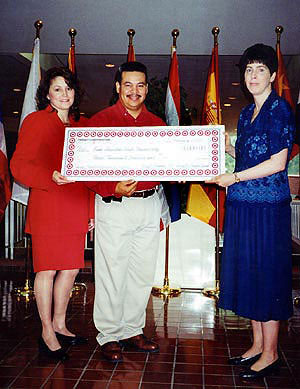 Alvarez presenting check