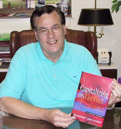 Dr. Gibson with his book