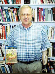 James Olson with book