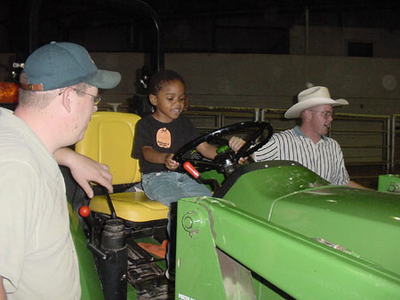 Girl on tractor